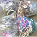 Four bags of costume jewellery and bangles