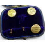 A pair of 15ct gold Masonic studs/buttons, 5.1g, 18mm diameter, one other stud/button and two