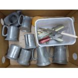 A collection of pewter tankards including English and one marked TP Arkim of Sheffield and flatware,