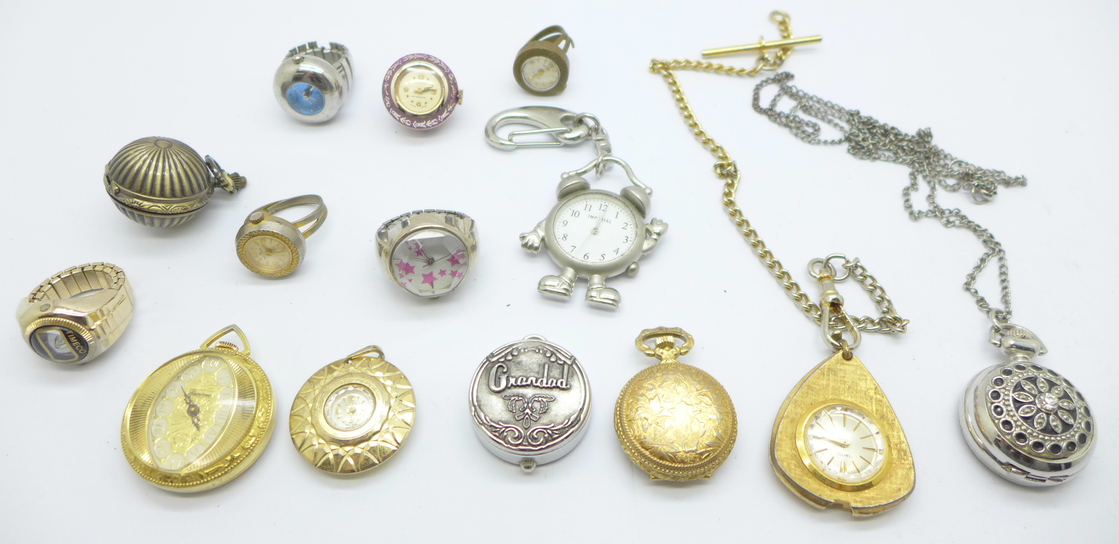 A collection of pendant and ring watches