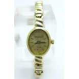 A lady's 9ct gold quartz wristwatch, total weight with movement 16.9g