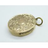 A Victorian double sided locket, 24mm x 29mm