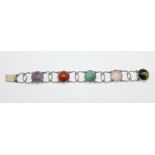 A silver and agate set Arts and Crafts bracelet, stones 17mm in diameter