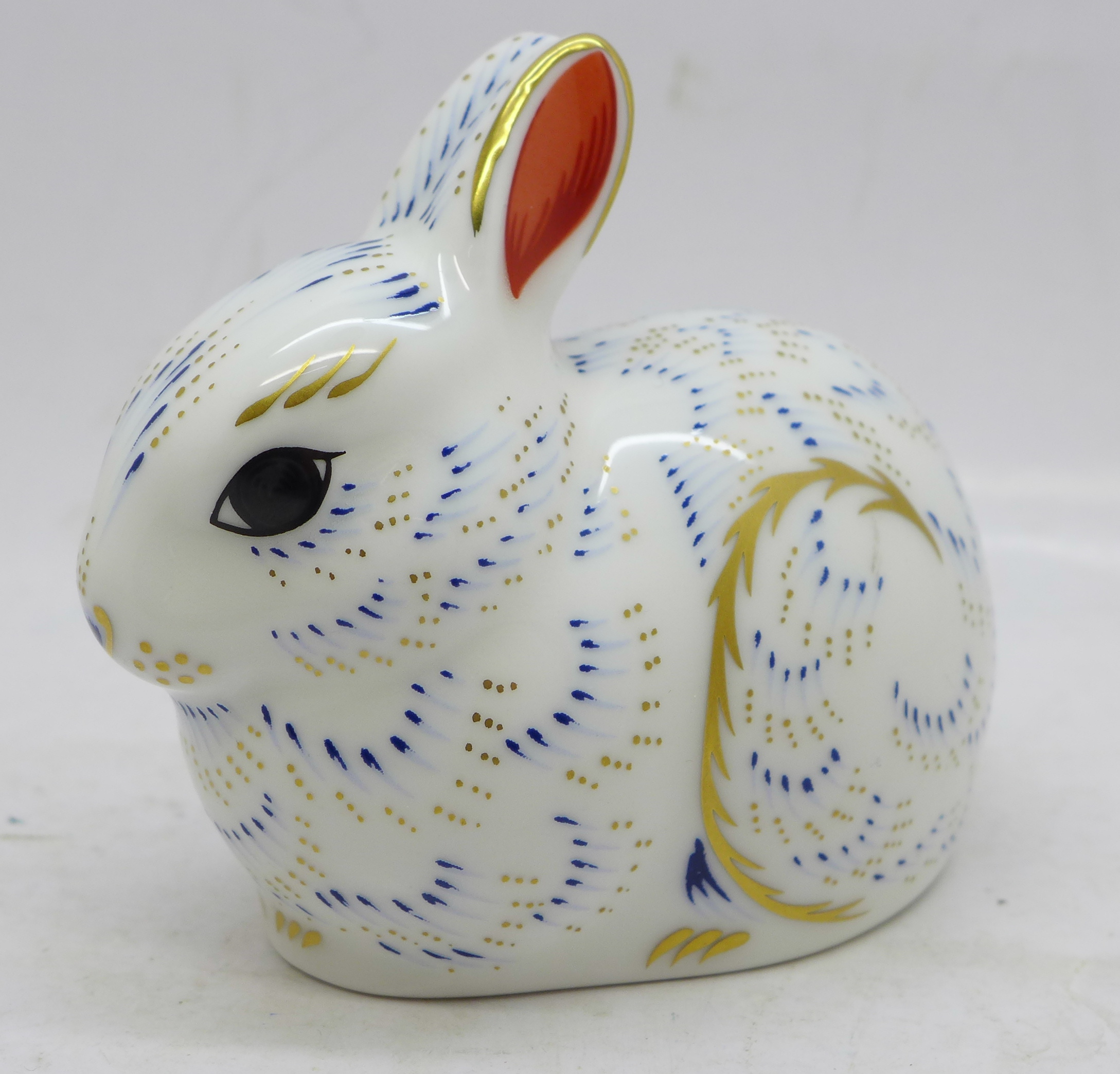 A Royal Crown Derby Collectors Guild bunny paperweight, gold stopper, with box, 7cm