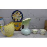 Two vases, Sylvac and Carltonware, two advertising tins, Blue Bird Toffee and Peak Frean and an