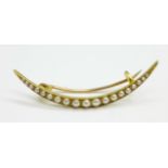A yellow metal and seed pearl brooch, 2.7g