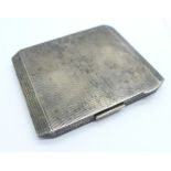 A silver compact, London 1939, 68g