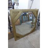 A gilt framed mirror