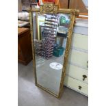 A gilt framed mirror