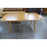 An Ercol Blonde Windsor dining table