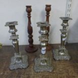 Three plated candlesticks and two others