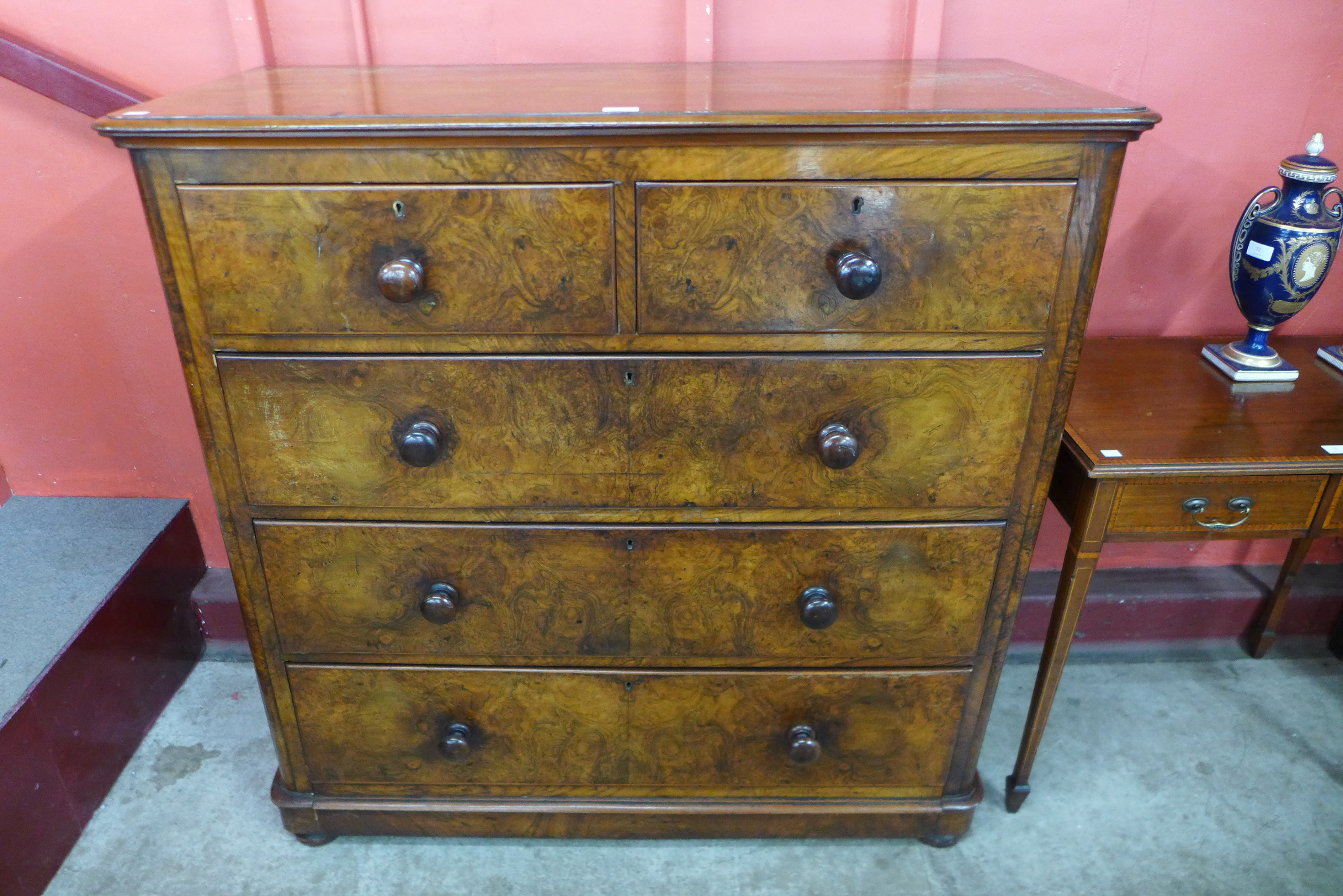 A Victorian figured walnut chest of drawers