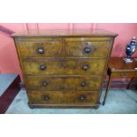A Victorian figured walnut chest of drawers