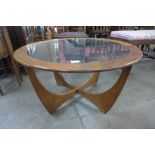 A G-Plan Astro teak and glass topped circular coffee table