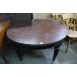 A Victorian mahogany circular dining table