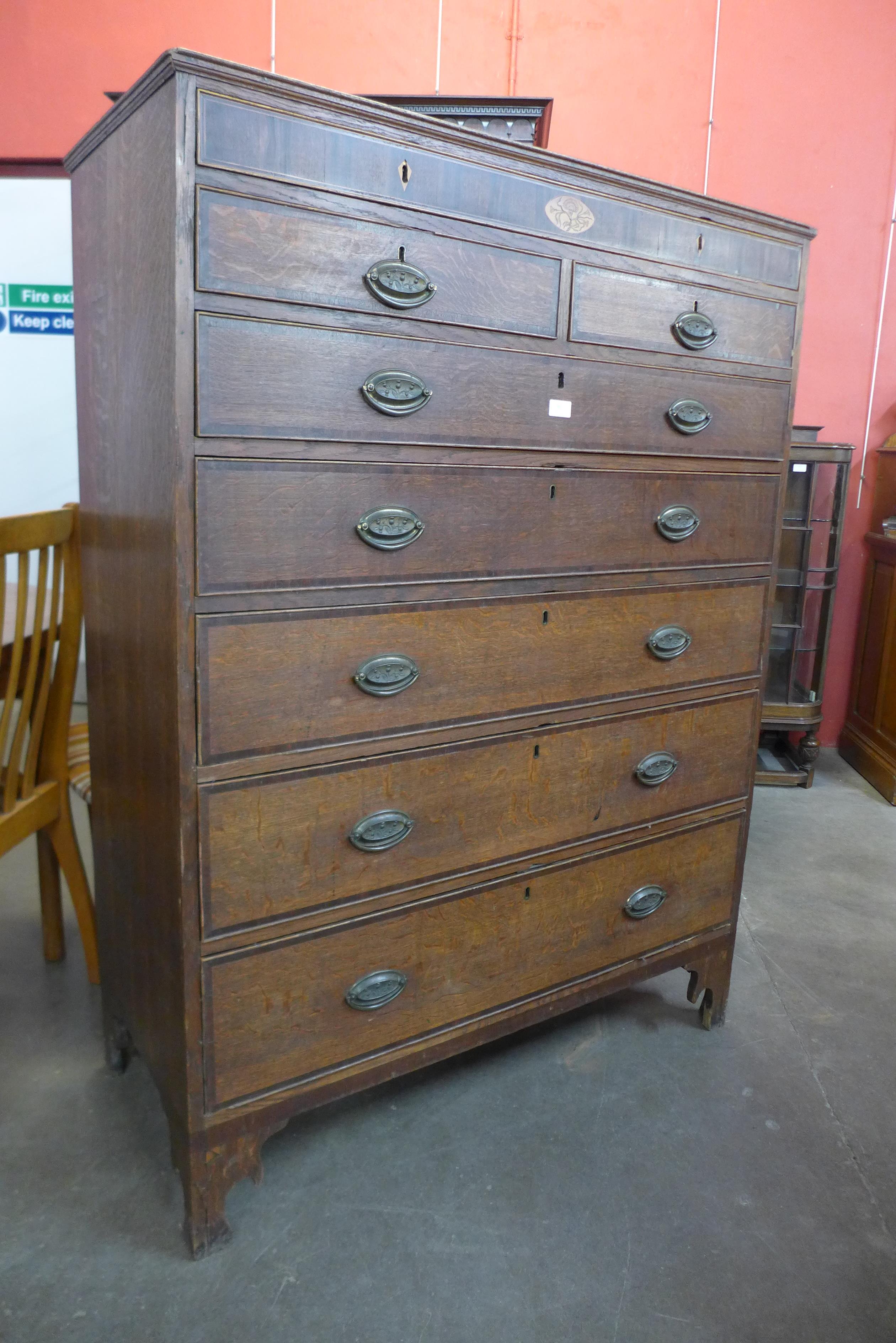 A George III Scottish inlaid oak chest of drawers