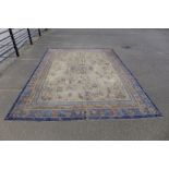 A large Chinese beige ground rug, 520 x 380cms