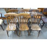 A set of six Victorian elm and beech kitchen chairs