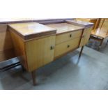 A small teak sideboard