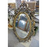 A gilt framed mirror