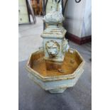A cast iron water font