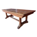 A Victorian Gothic Revival fruitwood refectory table, manner of A.W.N. Pugin, 77cms h, 244cms l,