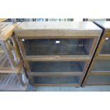 A Globe Wernicke oak three tier sectional stacking bookcase