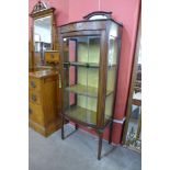 An Edward VII inlaid mahogany bow front display cabinet