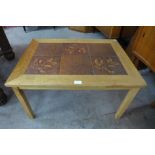 A Danish Gunnar N. Larsen Mobelfabrik light oak and tiled top coffee table