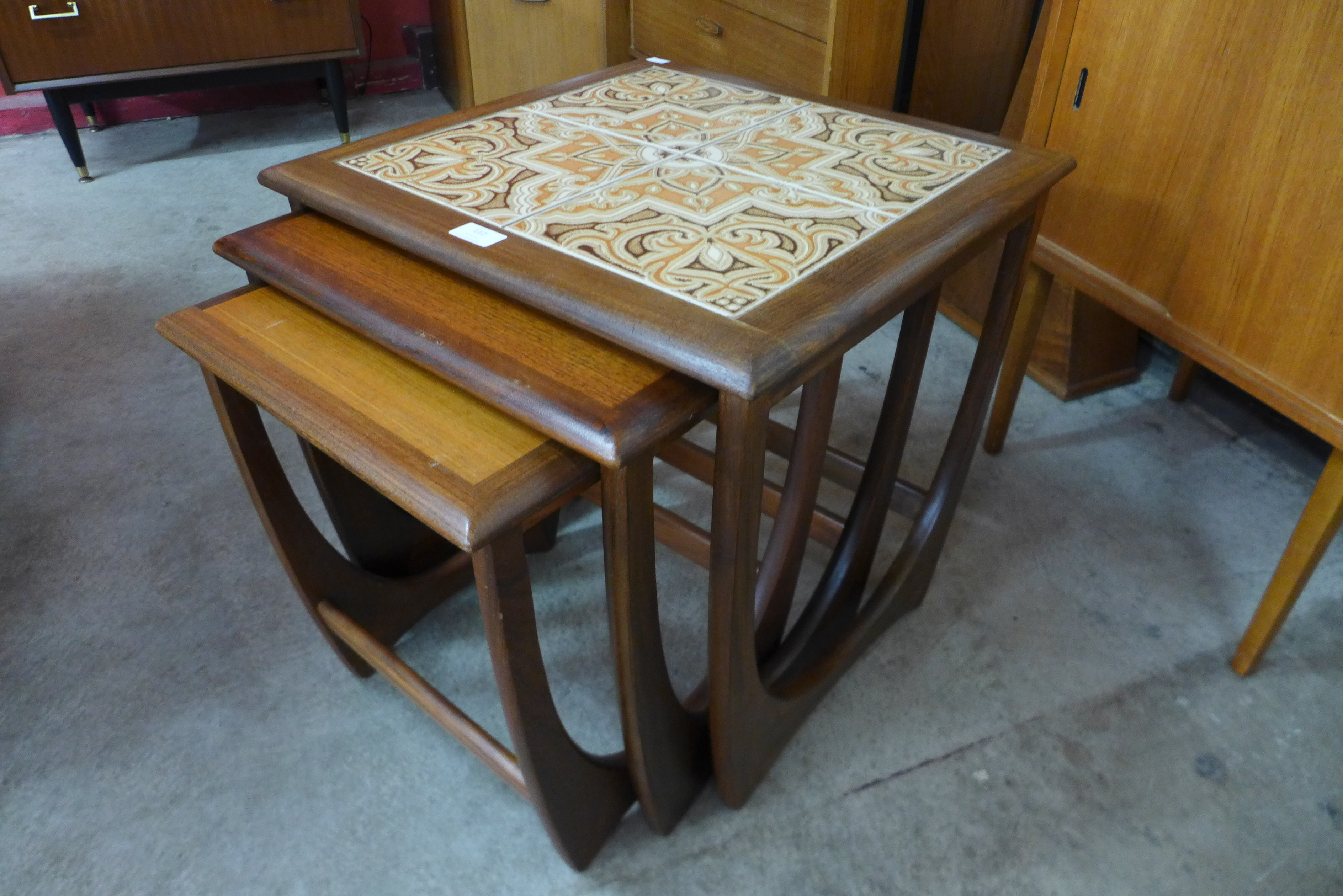 A G-Plan Fresco teak and tiled top nest of tables