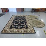 Three assorted rugs