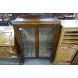 A mahogany display cabinet