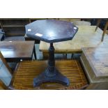 A William IV mahogany octagonal lamp table