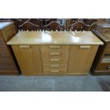 A White & Newton teak sideboard