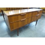 A small Austin Suite teak sideboard