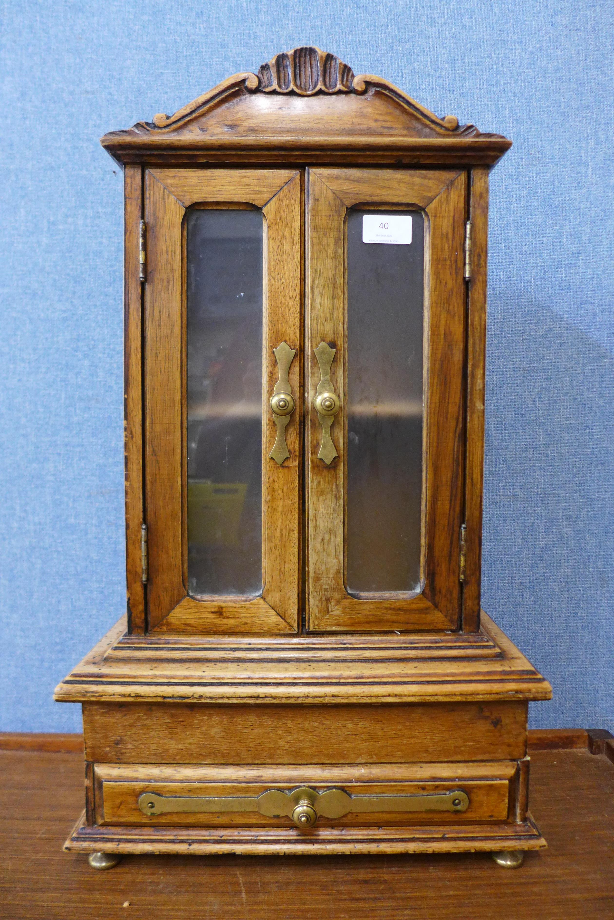 A miniature French fruitwood armoire, 63cms h - Image 2 of 2