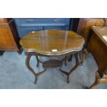 An Edward VII carved walnut occasional table
