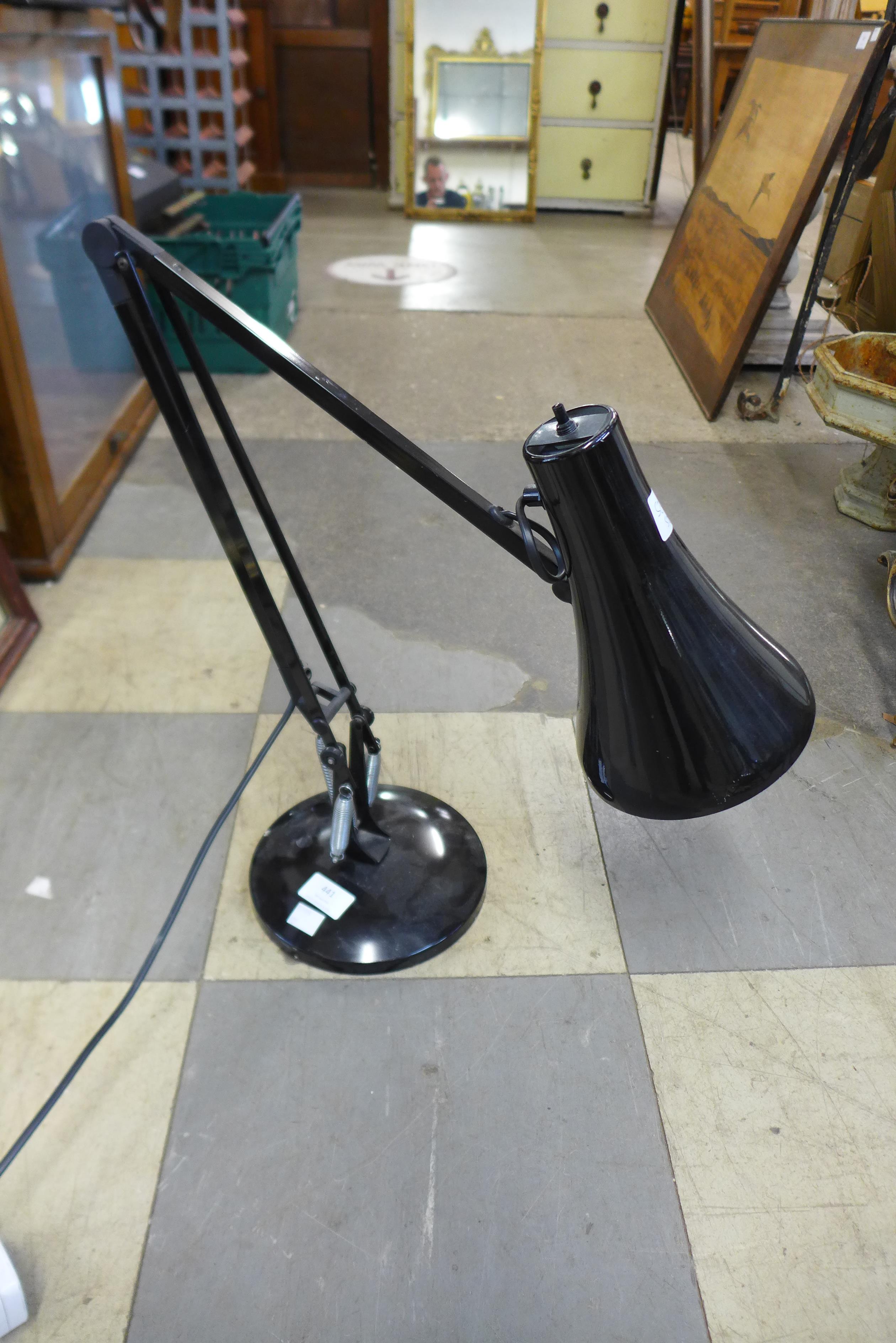 A black metal anglepoise lamp