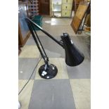 A black metal anglepoise lamp