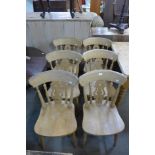 A set of six beech kitchen chairs