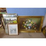 A large still life of flowers, oil on canvas, a mirror and prints