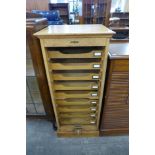 An Edward VII oak tambour front filing cabinet, a/f