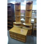 A pair of Nathan teak corner cabinets and a small cupboard