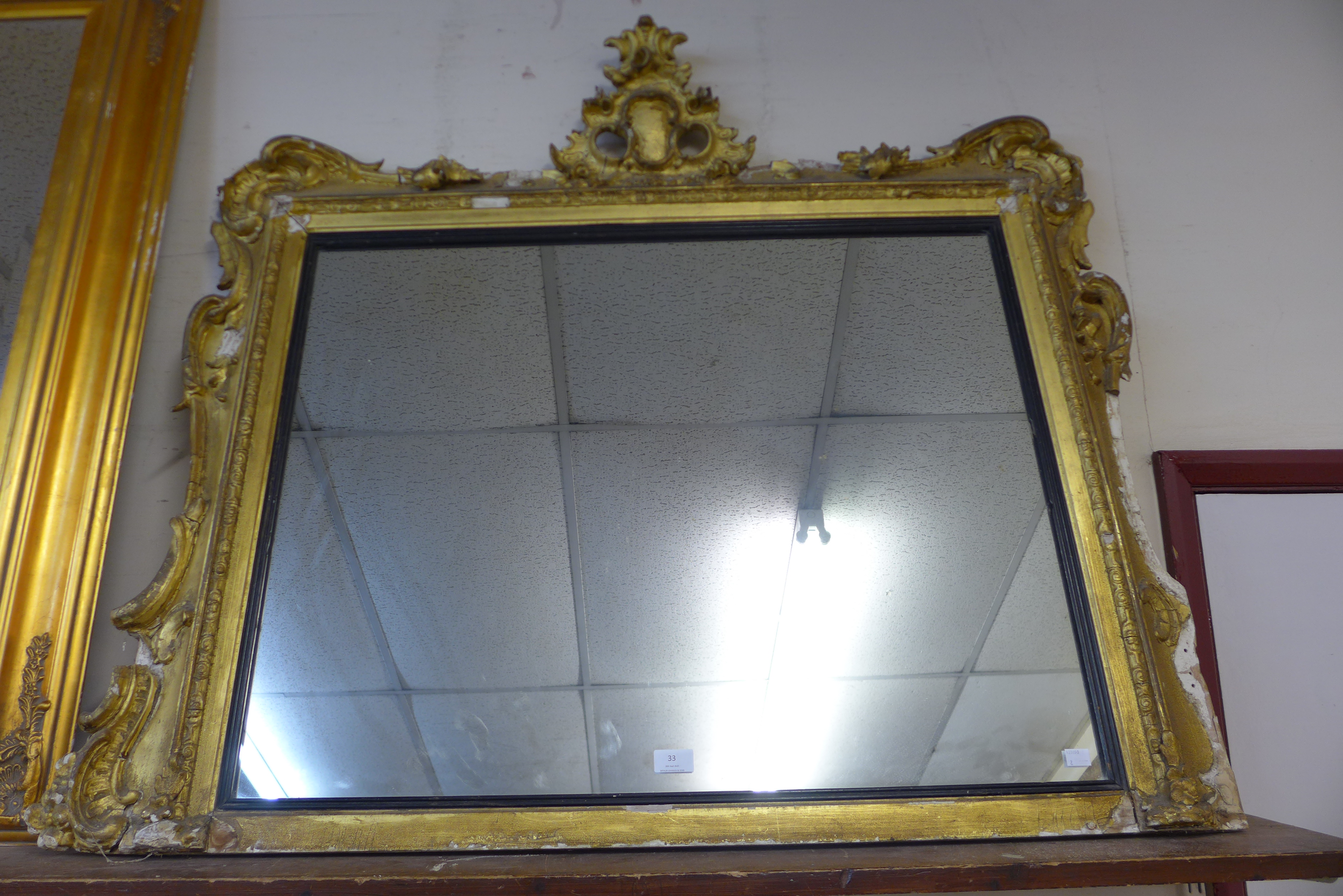 A Victorian gilt gesso framed overmantel mirror
