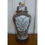 A large Chinese famille bleu porcelain vase and cover, on carved hardwood stand, 88cms h