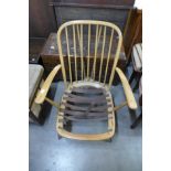 An Ercol Blonde Windsor low armchair