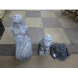 Three concrete garden ornaments