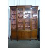 A George III style mahogany astragal glazed breakfront library bookcase, 211cms h,172cms w, 40cms d