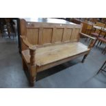 A Victorian style pine settle