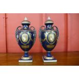 A pair of Meissen style porcelain vases and covers, depicting Queen Victorian and Prince Albert,